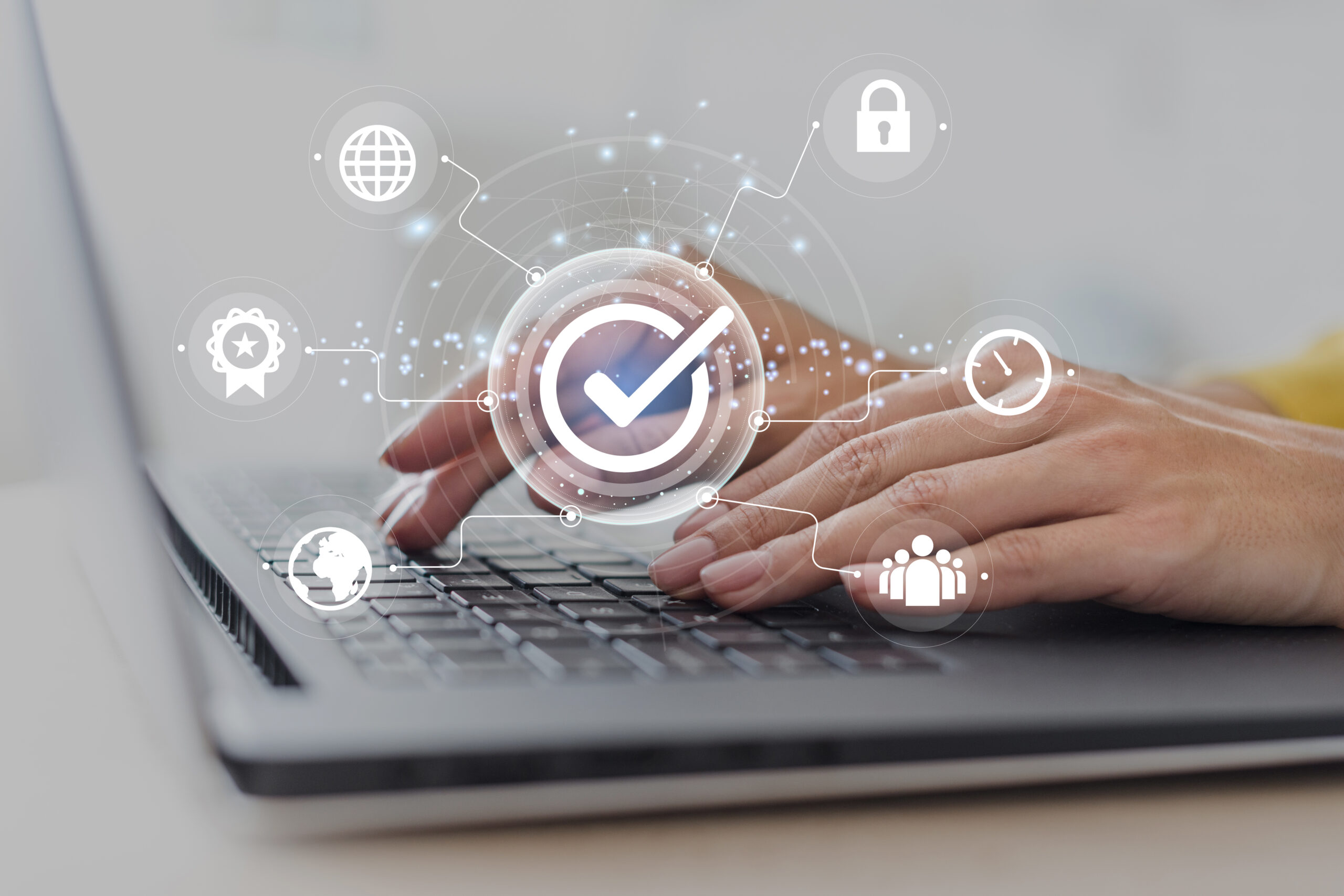 Icons on laptop representing connectivity and system verification